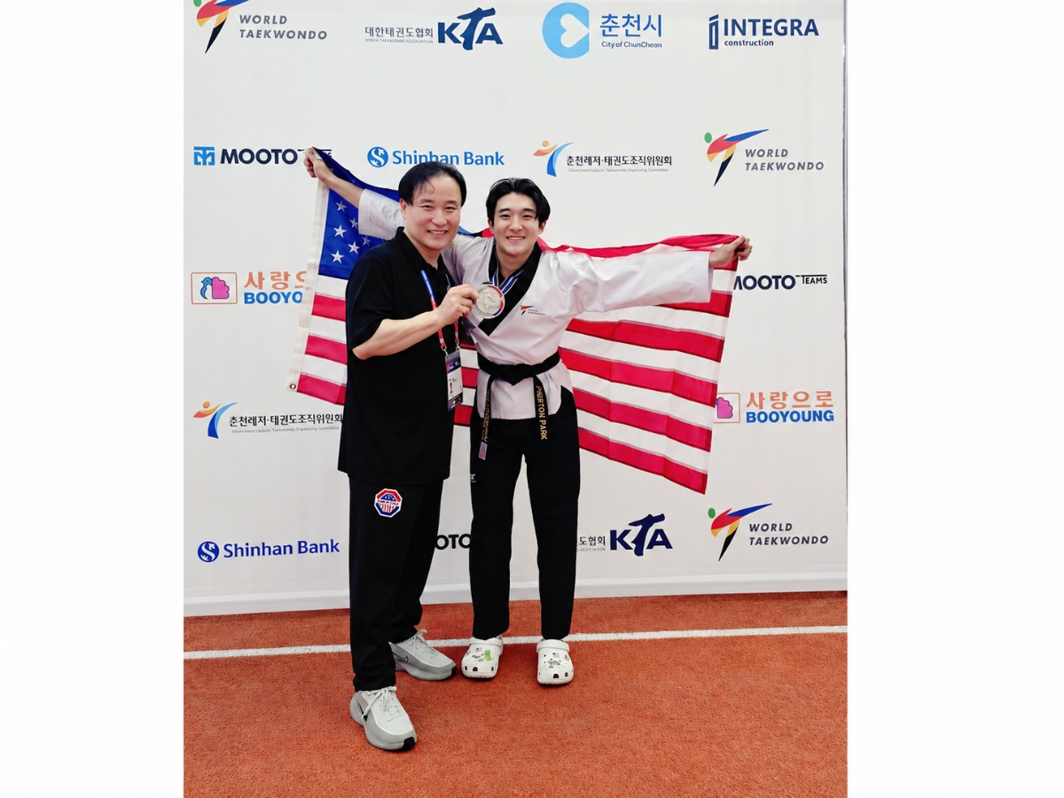Walt Whitman High School senior Preston Park displays the silver medal he earned while representing Team USA at the 2026 World Taekwondo Poomsae Championships in Chuncheon, South Korea.
