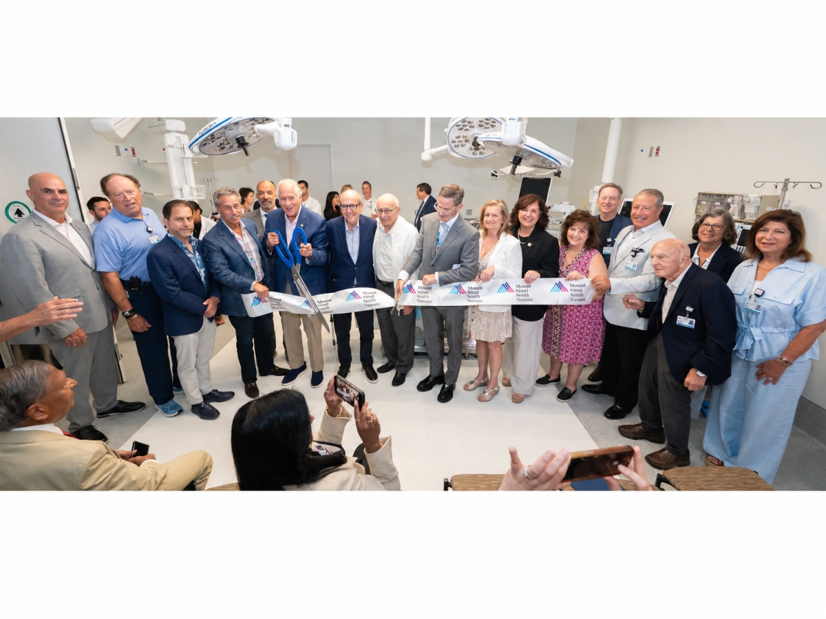 Mount Sinai South Nassau officials, supporters and staff gather for a ribbon-cutting inside one of the hospital’s operating rooms.