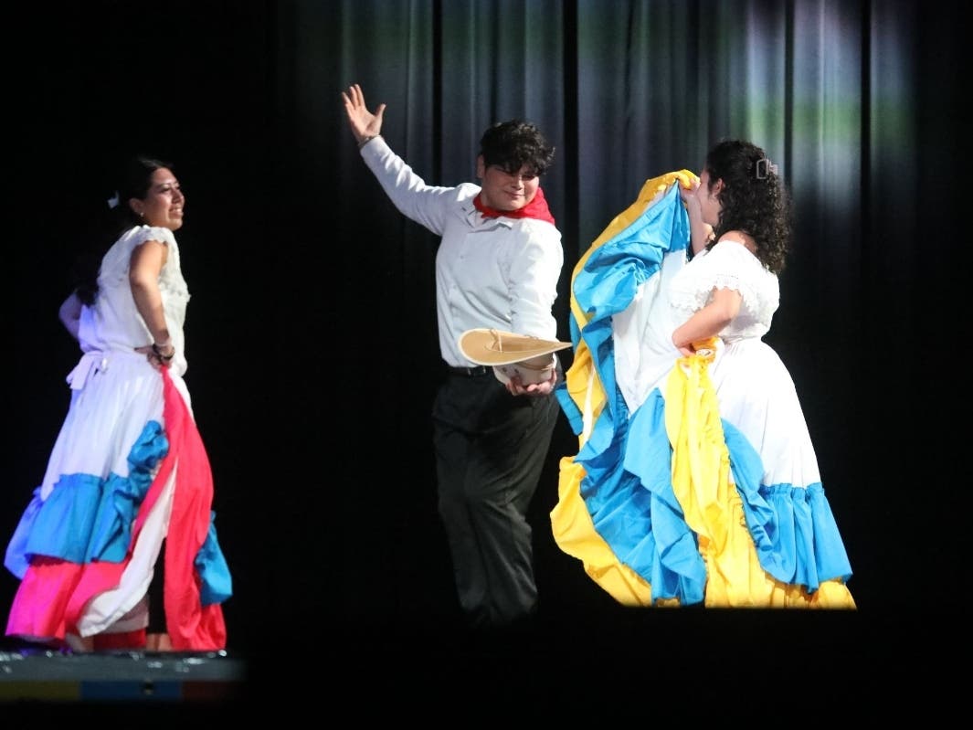 Members of Walt Whitman High School's Latino Heritage Club perform during the Town of Huntington's 32nd annual Hispanic Heritage Month Celebration on Oct. 13. Eleven students received scholarships during the event.