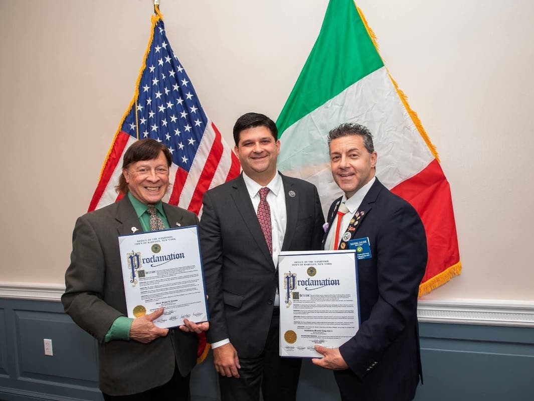 Councilman Anthony Manetta (center) presents proclamations to Village of Lindenhurst Mayor Mike Lavorata (left) and Daniel Calise (right), Vice President of the Sons and Daughters of Italy, Costantino Brumidi Lodge, accepted on the lodge’s behalf.