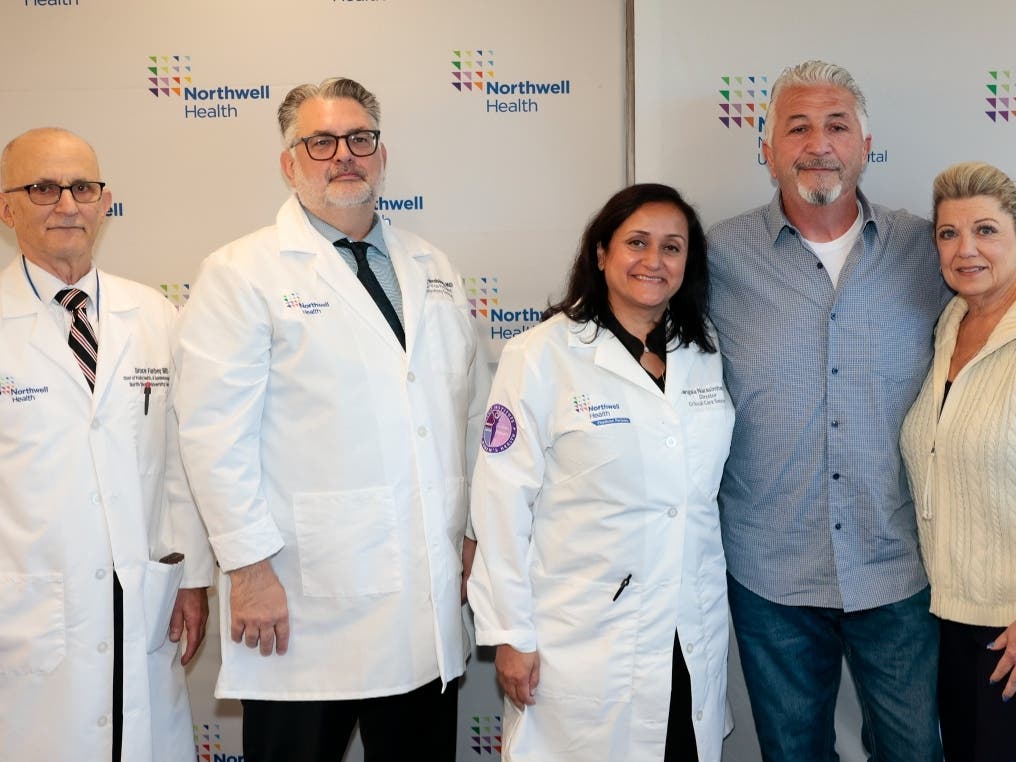 Northwell Health Drs. Bruce Farber, Dwayne Breining and Mangala Narasimhan, from left, with Frank and Theresa Bosco, encourage New Yorkers to get vaccinated against the flu.