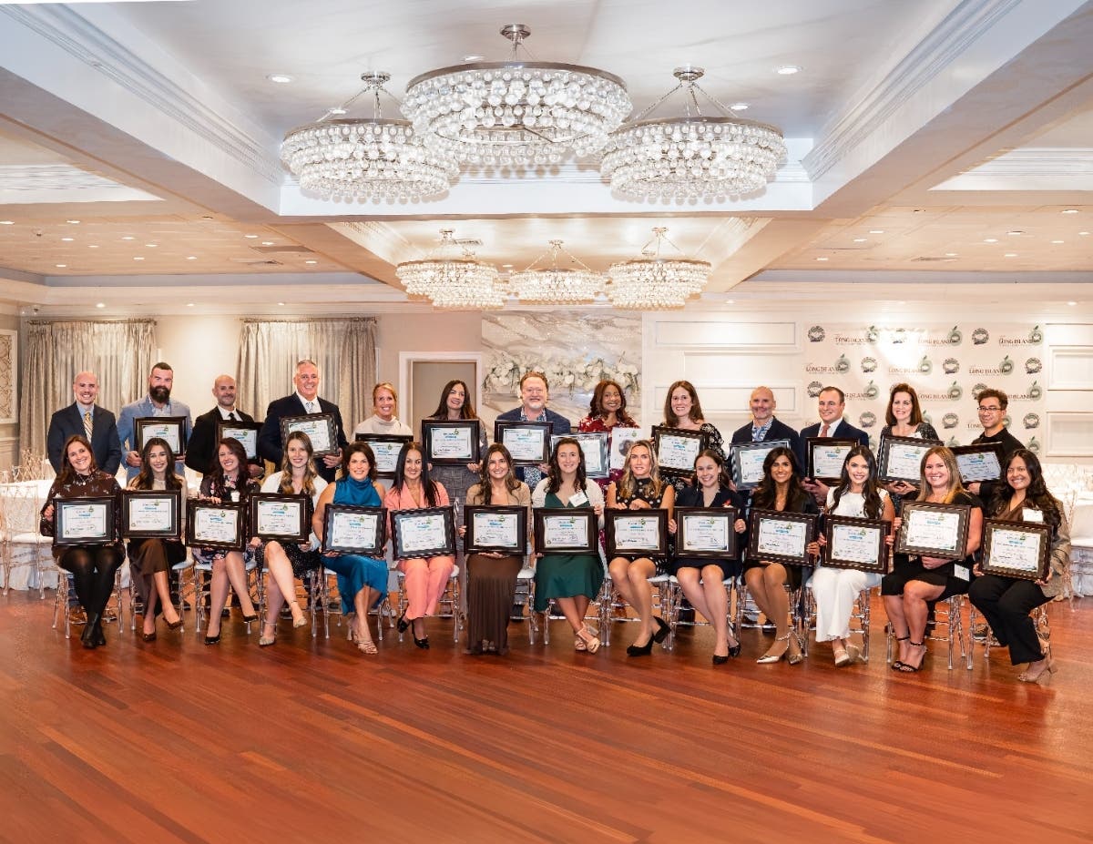 Honorees gather at the Long Island Coalition Against Bullying's third annual Long Island School Hero Awards, held Oct. 19 at The Watermill in Smithtown. 