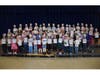 Lockhart Elementary School first graders displaying their finished personal narratives at a Jan. 14 celebration. 