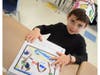 First grader Dylan Ricco Galluzzo, whose personal narrative told the story of a family vacation. 
