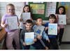 Seaford Manor Elementary School third graders with their nonfiction "expert books." 