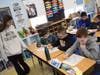 Sophomore Dylan DiScala helped some fifth grade students simplify fractions. 