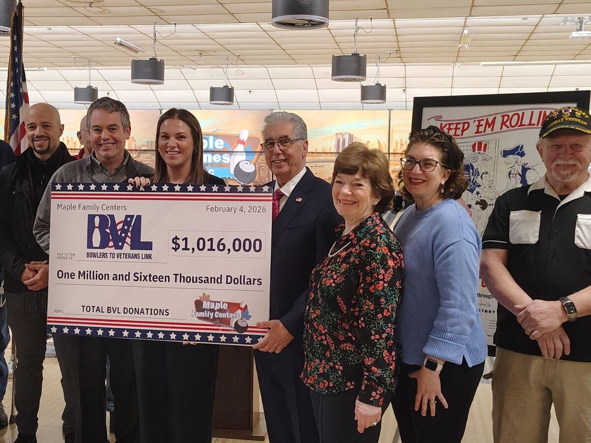 Jessica Abel, Executive Director of BVL (center), accepted a ceremonial check for $1,016,000 from Joe LaSpina (second from left), John LaSpina (fourth from right), Anita LaSpina (third from right) and Teresa LaSpina McCarthy (second from right).