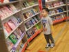 Kindergartener James Calvo carefully considers his options at the book fair. 
