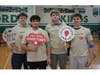 (from left) Seaford seniors Michael Foote, Carmelo Riccobono, Jack DiPietro and Brian Falk donated blood as part of Friday's blood drive. 