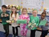 From left, kindergarteners Dominic Schiff, Lena Triculis, Emma Rheel, Taylor Holzapfel and Noah Verlus with their leprechaun traps. 