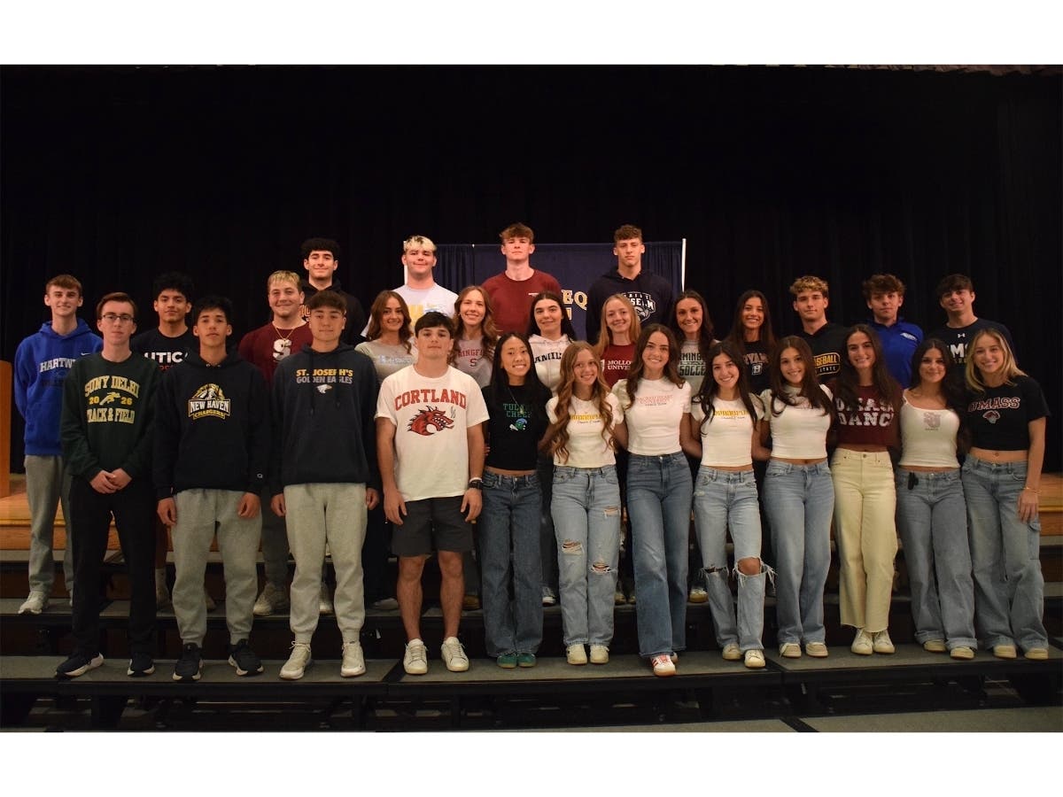 The 28 Massapequa seniors who have signed on to play sports in college, at a May 1 signing day ceremony.
