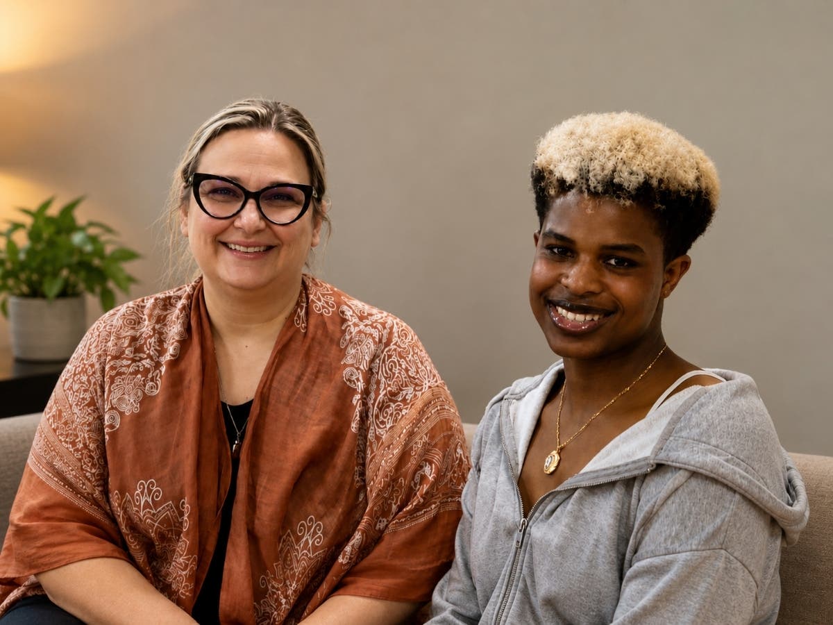 Michael Marshall and his art teacher, Jenna Petikas. District officials said Petikas' support was integral to the realization of Michael's artistic vision that won him a PTA Merit Award.