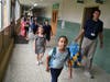 Walking those students to their classes was Trent Mayer, a new physical education teacher at Manor Elementary. 