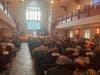 Grace Center of Hope Pastor Darin Weiss, CEO speaks to program graduates and their families and friends. 
