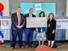 Paul Keifer, President, Bank of America West Michigan; Barry Mullan, Director, Consumer Banking Region Executive; Melissa Jelinski, Donor Relationship Manager at Feeding America West Michigan; and Mary Jane Berklich, SVP, Market Executive West Michigan.