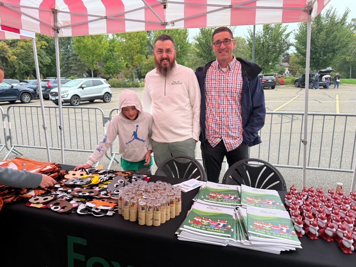 Fox Rothschild Partners JT Schuweiler, Michael McNally and Keegan McNally, Michael’s son, ran the firm’s activity table at the St. David’s Developmental & Therapeutic Services’ Get Out and Grow event.