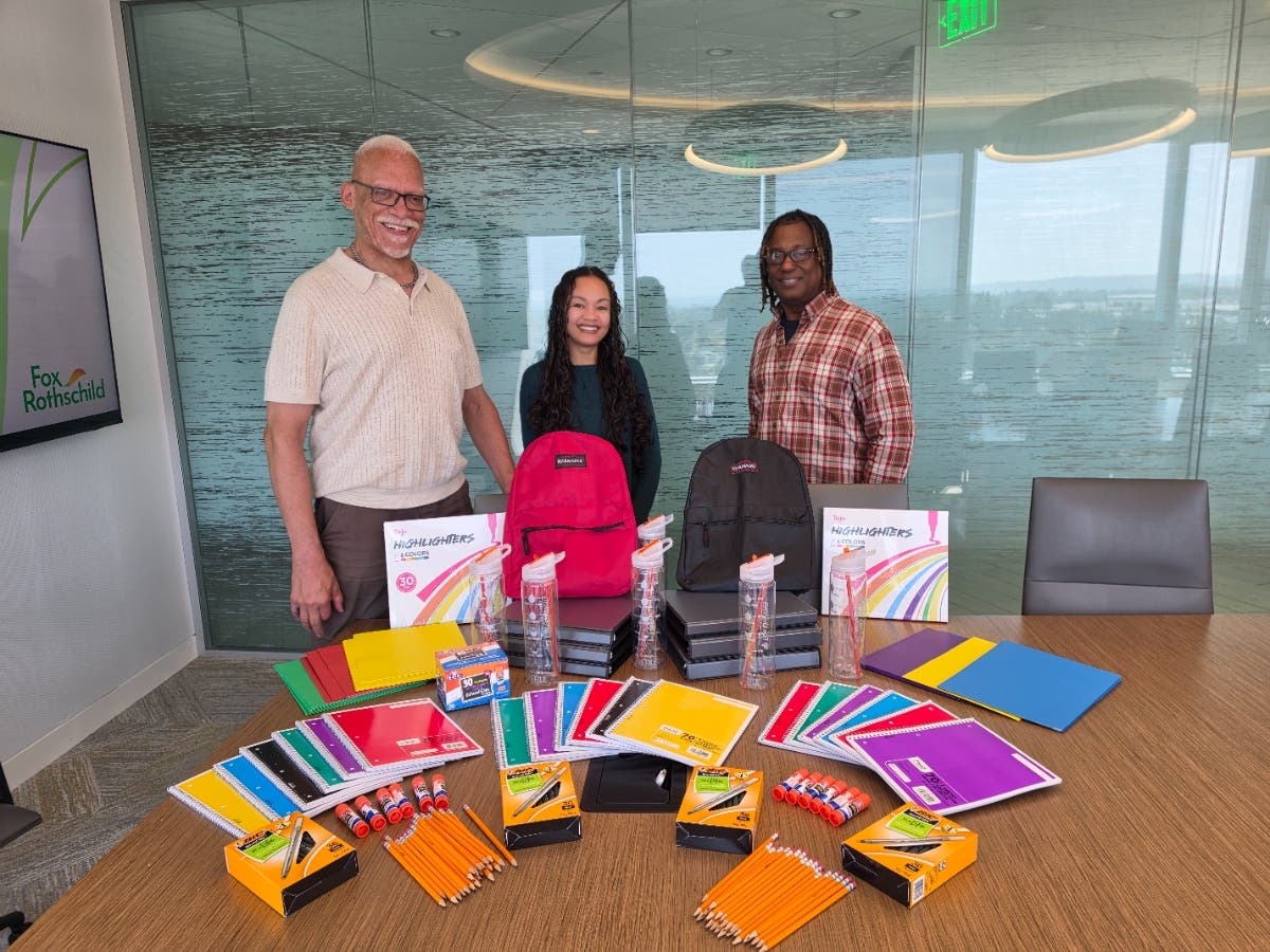 Members of Fox Rothschild's Los Angeles office, including Kevin Cade, Chelsea Cortez and Antoine Jackson pictured from left to right, donated over 200 school supplies to Los Angeles County School District.