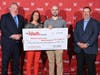 Pictured from left is The Nash Vice President of Marketing Tim Schipper, Nashua Community Music School Executive Director Lindsay Rinaldi, Assistant Director Cody Switzer and The Nash Chief Financial Officer Jamie Sanko.