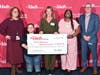 Pictured is The Nash Director of Communications & Charity Christine Latino, Revive Recovery Resource Center Director of Operations Priscilla Matos, Executive Director Jessica Carter, Board Member Shewanda Lopez and The Nash General Manager Eric Althaus.