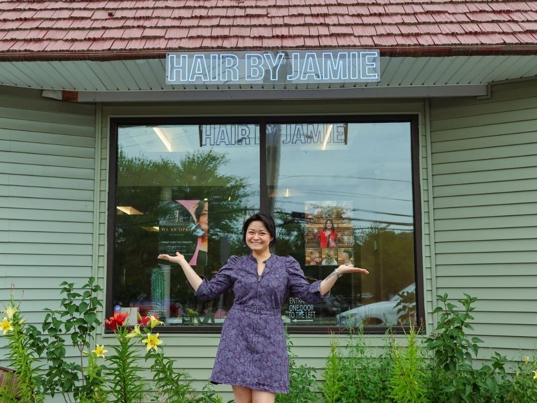 Jamie Miee stands outside Hair by Jamie after turning a longtime dream of business ownership into reality.