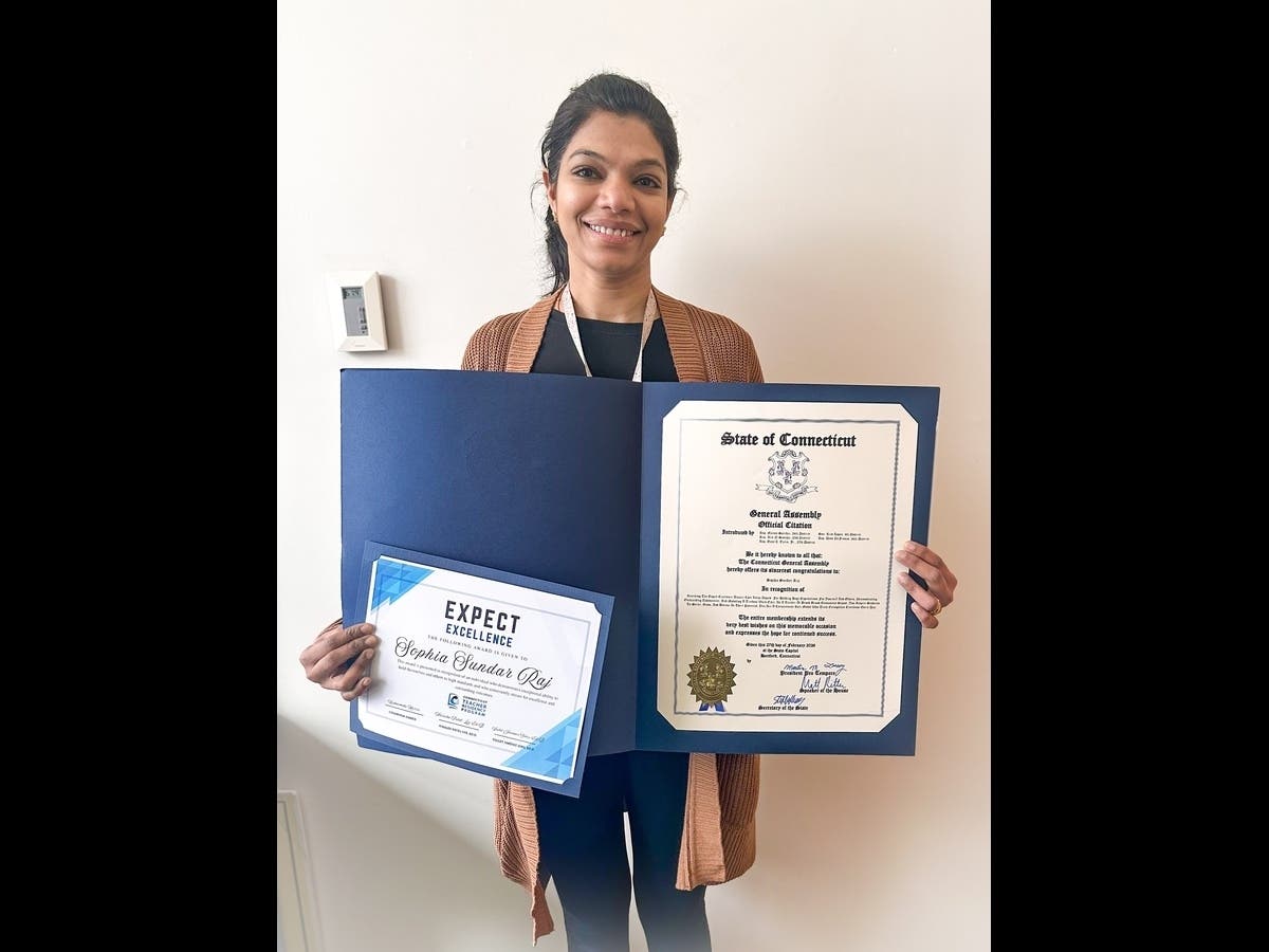 The recognition spotlights a third-grade teacher praised by the district for representing its values.