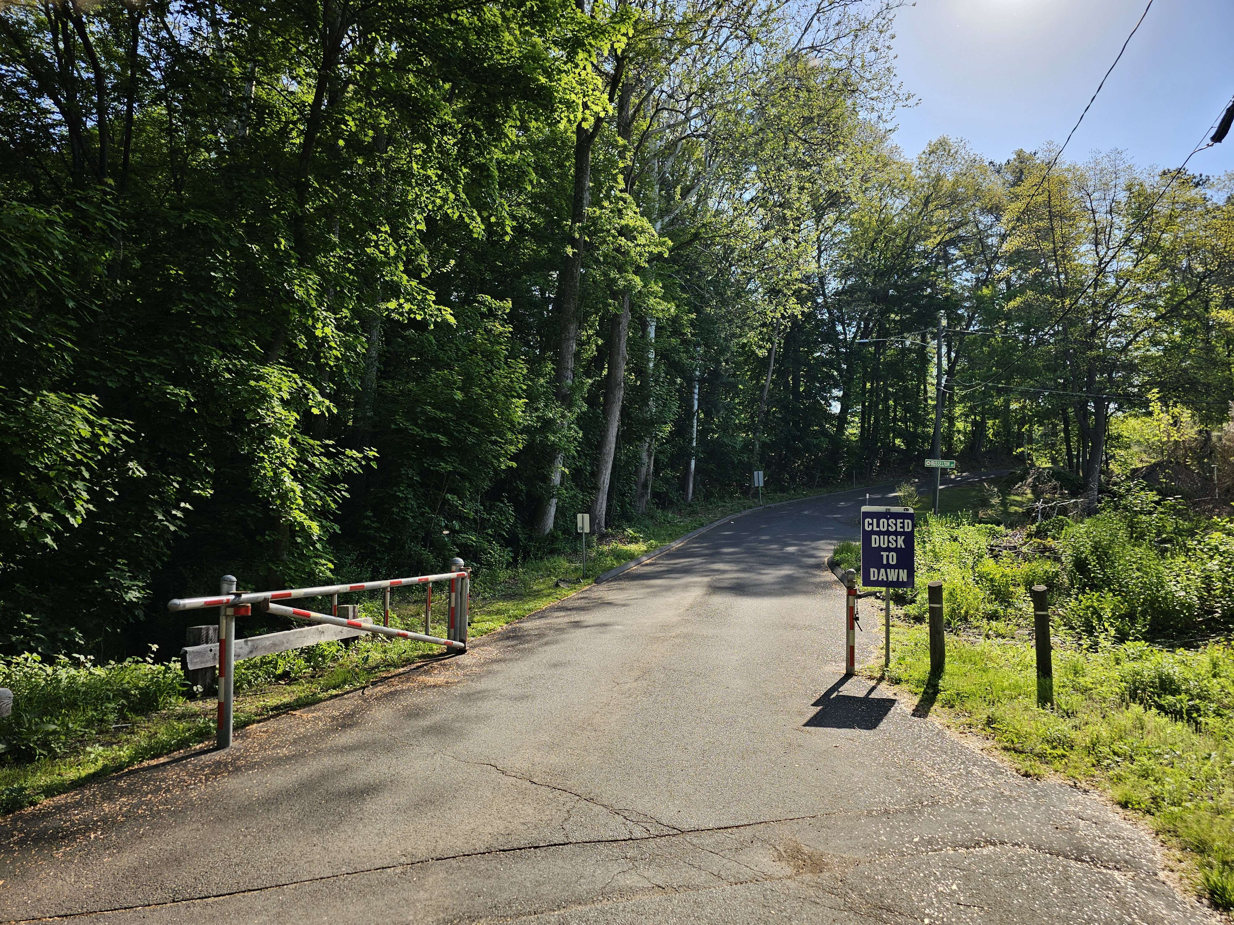 A photograph of the vehicular entrance to East Granby's Granbrook Park in Spring 2026.