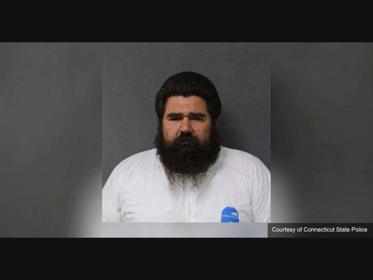 Joshua Freitag, 33, of Somers, was charged with murder, home invasion and two counts of risk of injury to a child in connection with Tuesday's fatal shooting on South Road, state police said.