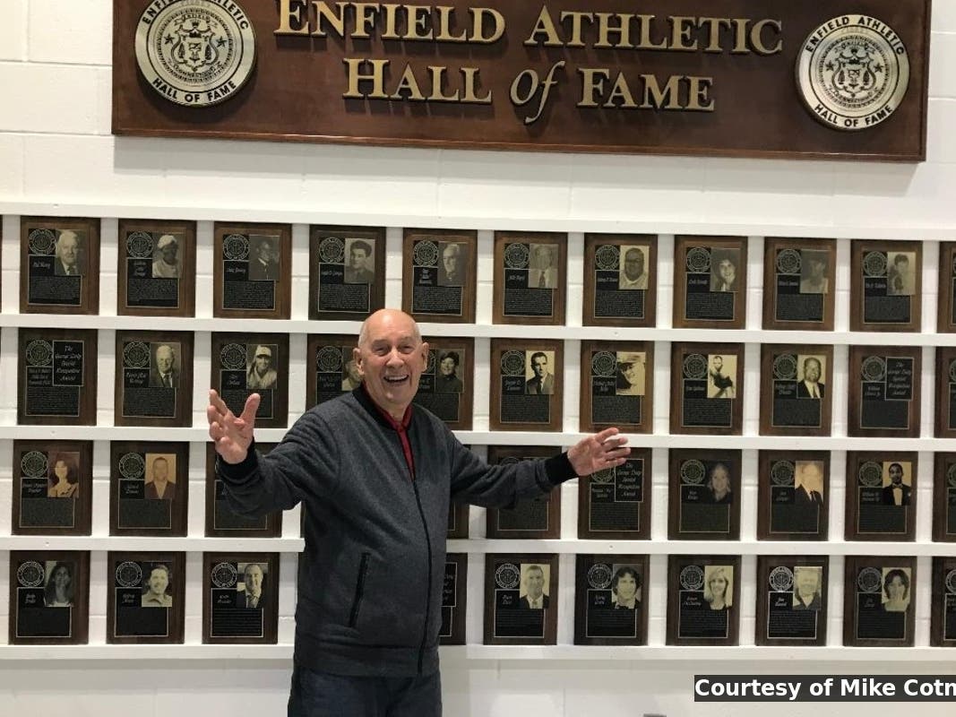 ESPN founder Bill Rasmussen visits the Enfield Athletic Hall of Fame display at Enfield High School.