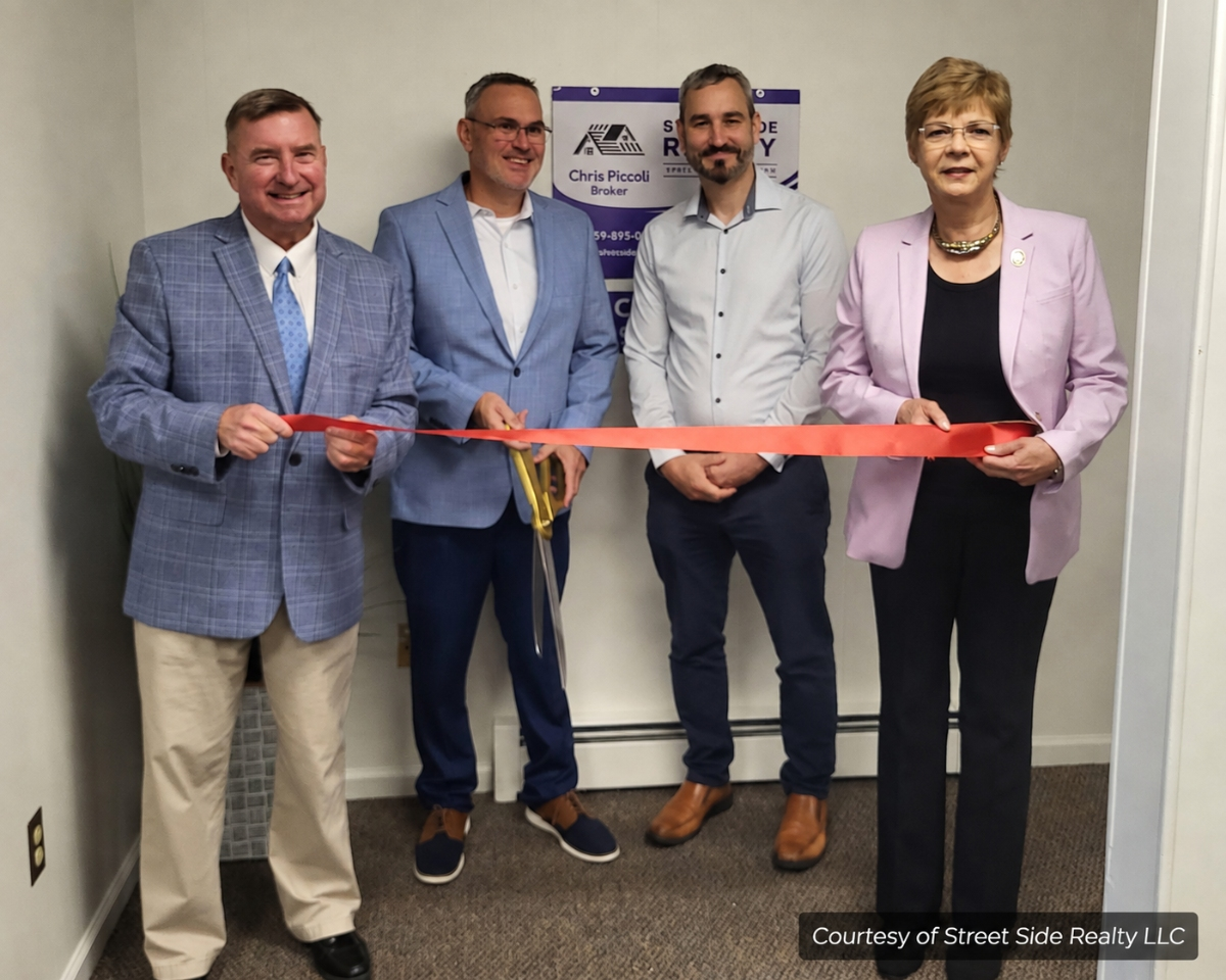 From left, state Sen. John A. Kissel, Street Side Realty broker Chris Piccoli, Suffield First Selectman Colin Moll and state Rep. Tami Zawistowski attend a ribbon-cutting for the brokerage’s new office at 133 Mountain Road.