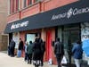 People wait in line outside of Chicago Hope Food Pantry, Thursday, Nov. 20, 2025, in Logan Square.