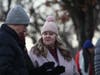 Persons greeting and socializing at the municipal complex for a menorah lighting event in Hillsborough, New Jersey