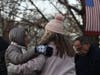 Persons greeting and socializing at the municipal complex for a menorah lighting event in Hillsborough, New Jersey