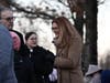 Persons greeting and socializing at the municipal complex for a menorah lighting event in Hillsborough, New Jersey