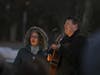 Persons singing at the municipal complex for a menorah lighting event in Hillsborough, New Jersey
