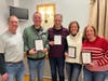 The team of Just Like Matt Murphy’s earned the distinction of top-finishing Rookie of the Year Team at the TSF Trivia Team Challenge. TSF President T.J. White (left) congratulates team members Greg Flynn, Steven Tulloch, Carrie Flynn, and Lauren Tulloch.