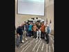 Members of Harmony School of Innovation-Dallas’s award-winning drone team gather with campus leaders following their championship victory.