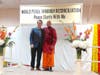 Hindu priest Ravi and UPF Regional President Dr. Michael Jenkins pose after crossing the Bridge of Peace.