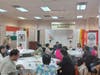 Participants engage in dialogue during the community interfaith event.