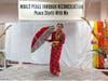 Shreejana Uprety, a Holistic Health Counselor, Yoga Instructor and Ayurveda Practitioner originally from Nepal, performs a Hindu folk dance.