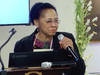 Barbara Moseley-Marks welcomes participants to the International Day of Peace program.