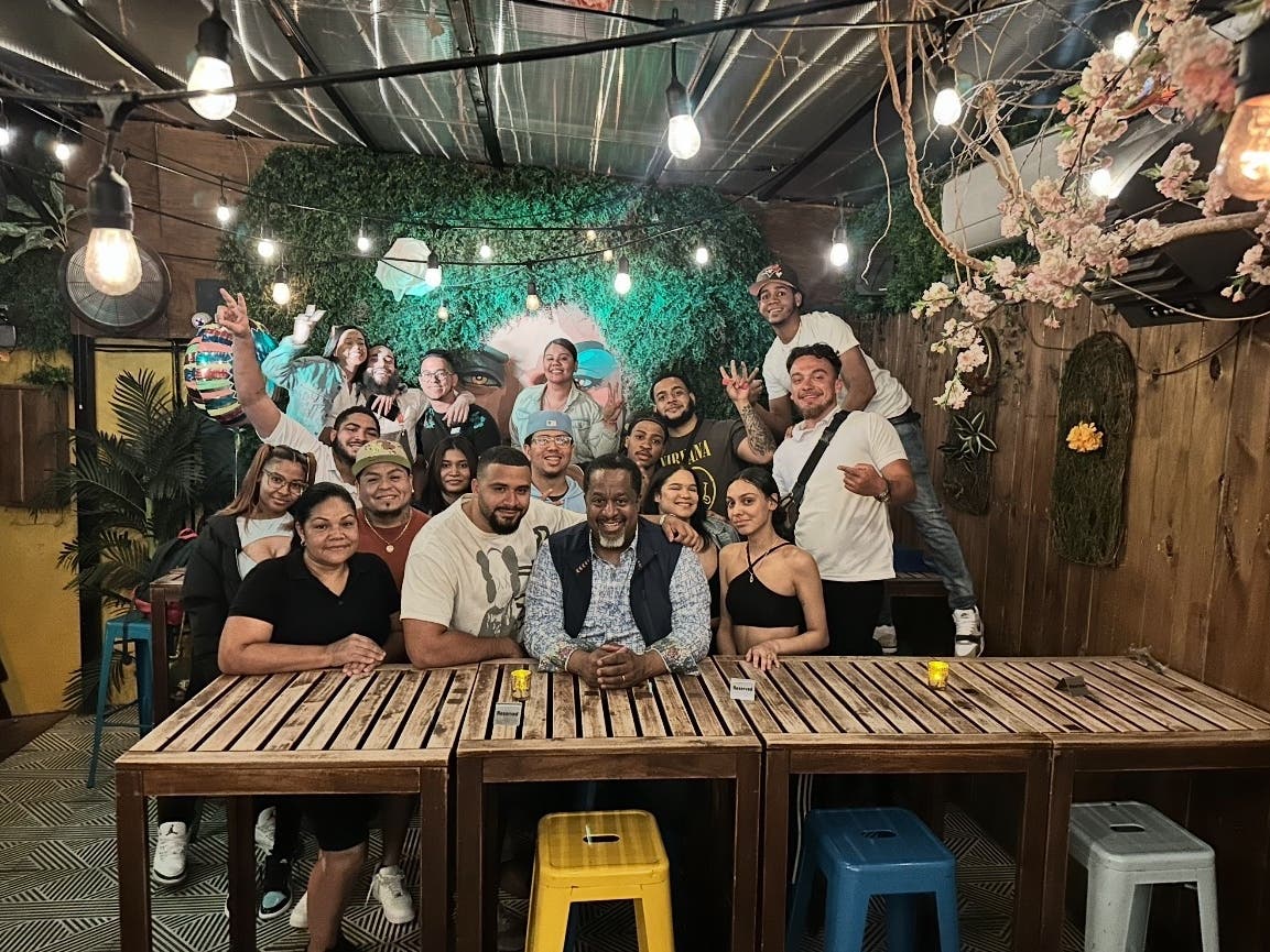 Owner Matthew Fermin, center, launched a GoFundMe to help cover two months of payroll for the restaurant's 30 employees while they searched for new work.