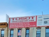 A property on Third Avenue between 44th and 45th streets cited by the New York City Department of Buildings for multiple sign violations.