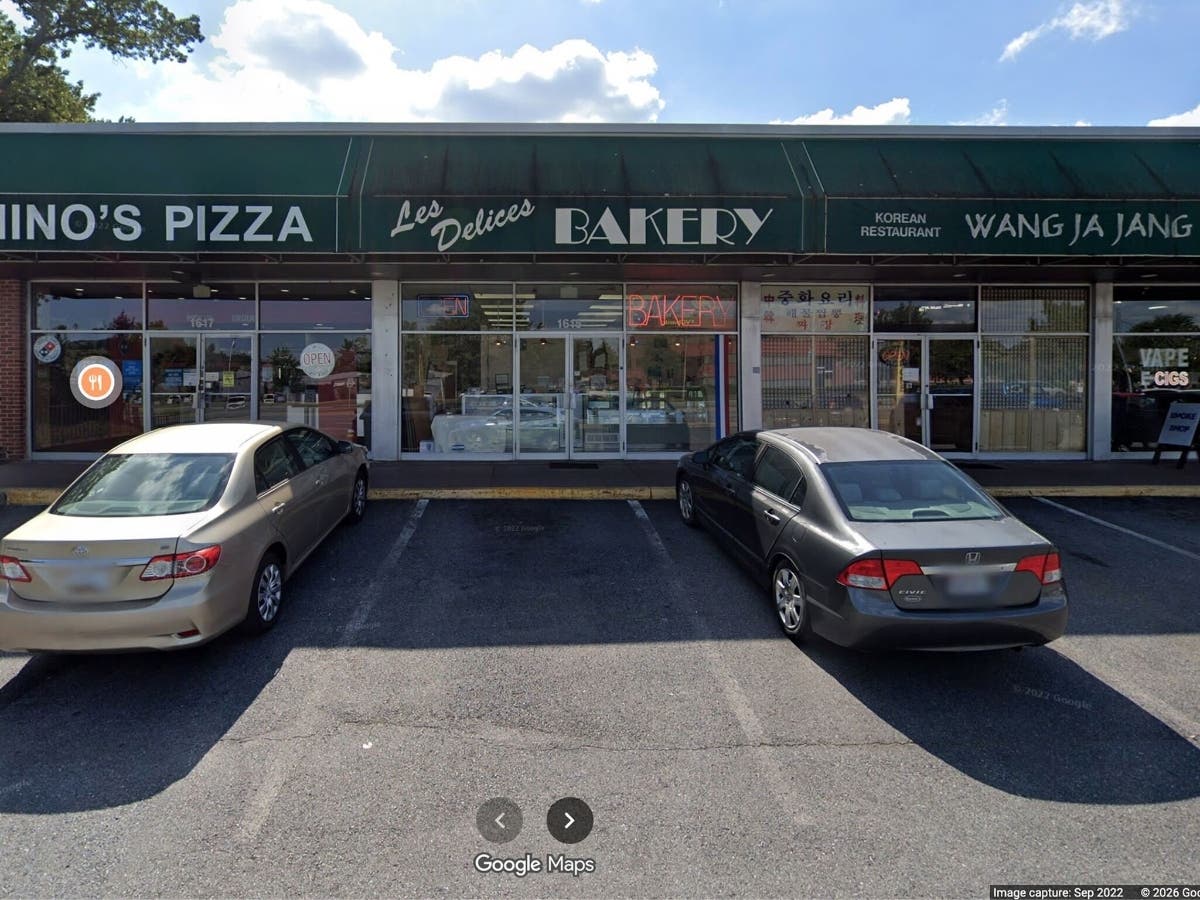 Les Délices French Bakery has reopened after funeral services were held for its head chef.