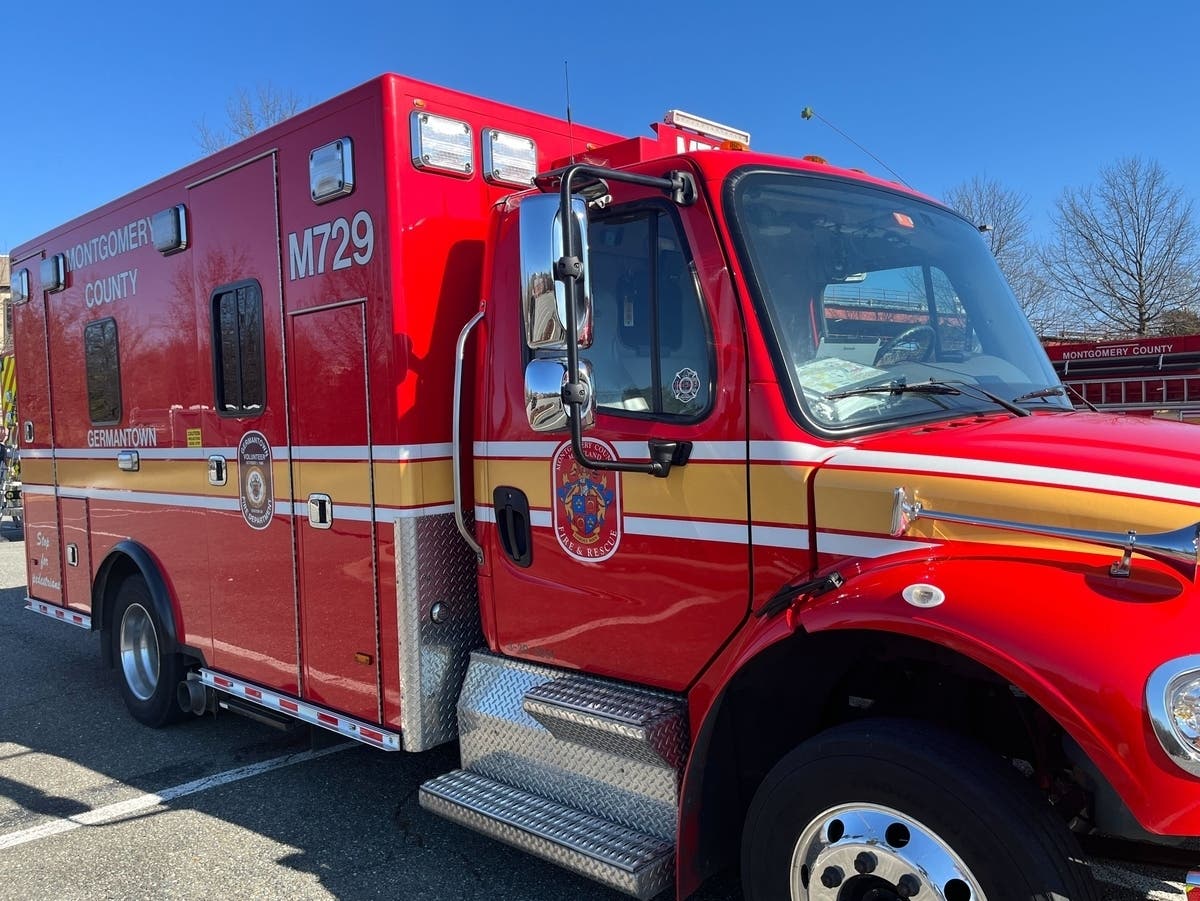 A woman was hospitalized and three staffers with the Montgomery County Fire and Rescue Service were evaluated for non-life-threatening injuries after a car crashed in an ambulance.