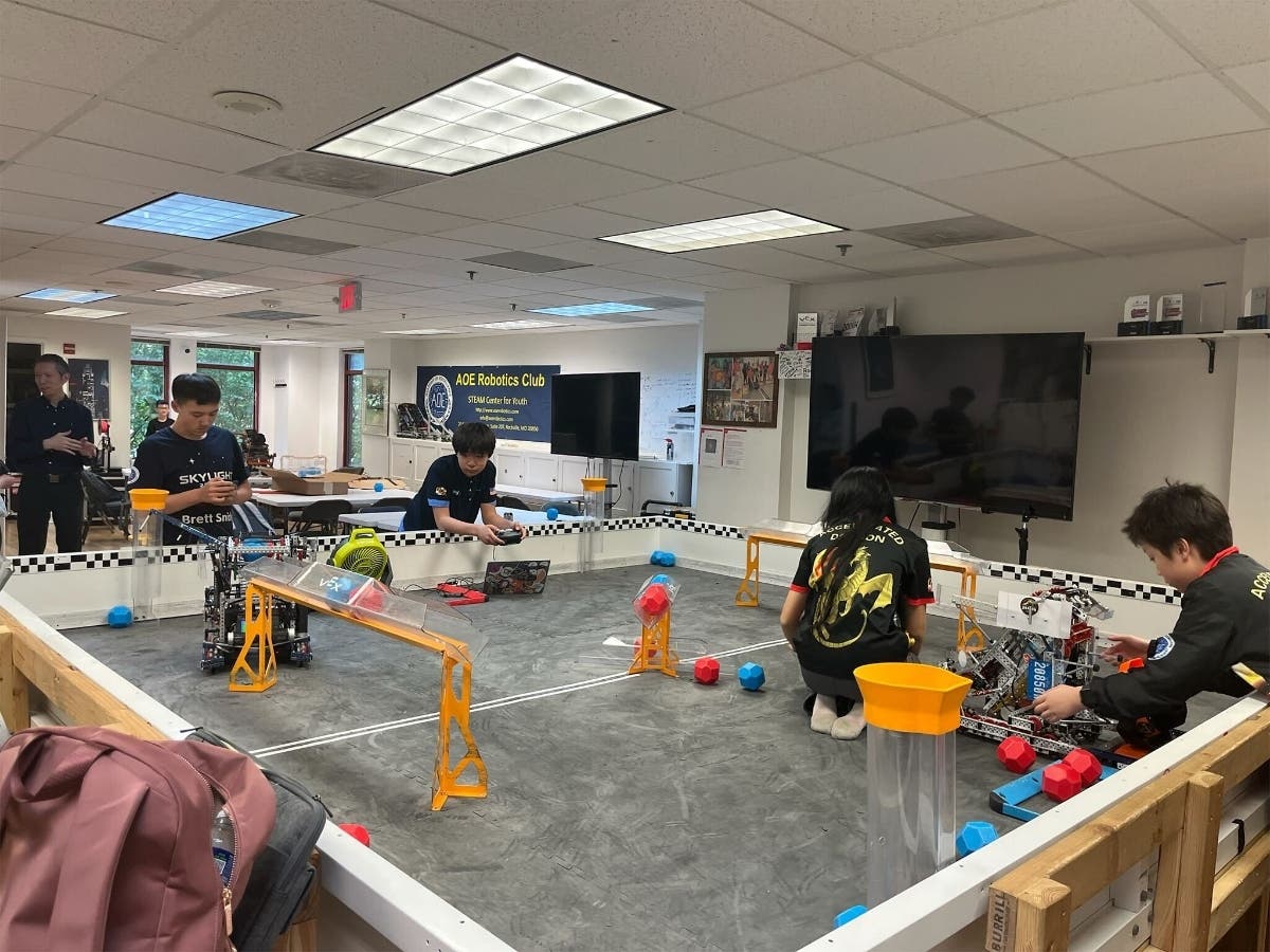 Members of the AOE Robotics Club, which is competing in the 2026 VEX World Championship, are seen testing their robots.
