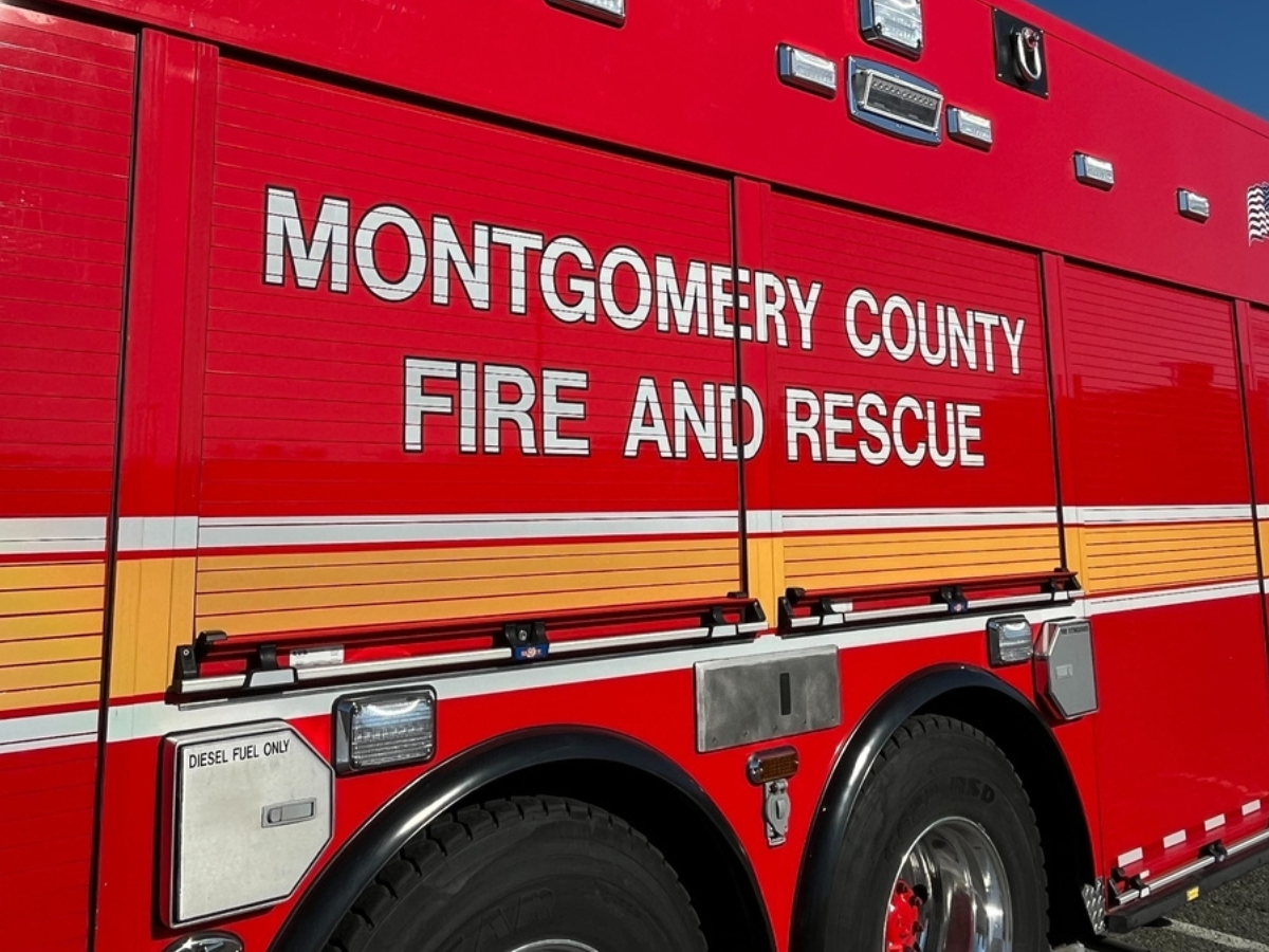 Two construction workers were forced to break into an apartment building after their scaffolding became unsecured during Monday's severe storms.
