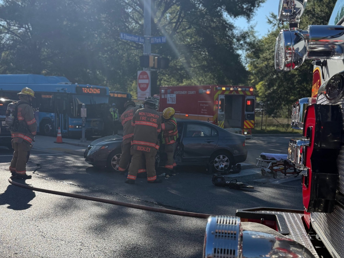 One person was hospitalized early Tuesday following a car crash near the Rockville Metro Station.