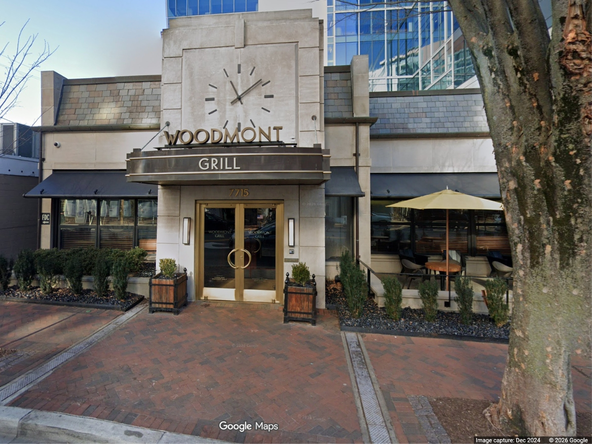 The site of the former Woodmont Grill in Bethesda has been sold for $7 million.