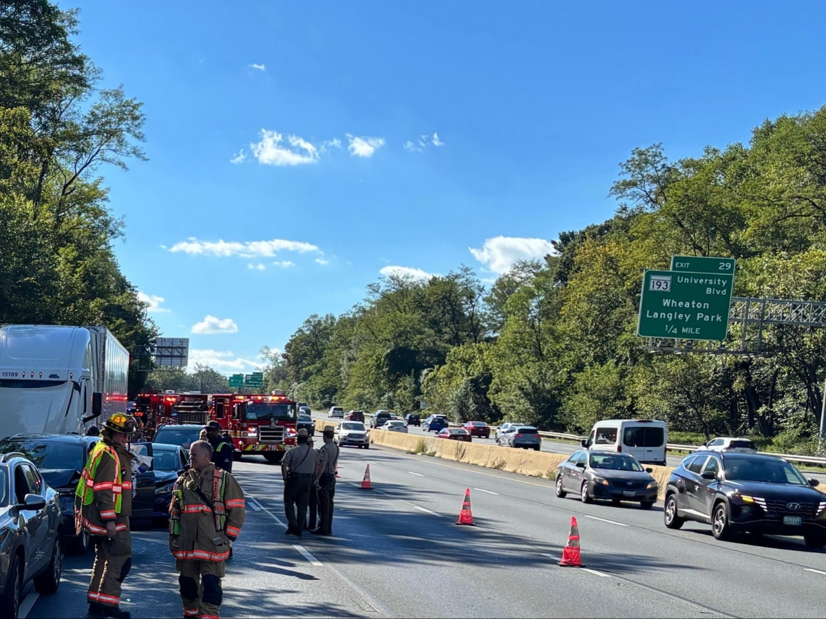 Authorities said about 20 people were evaluated after a mechanical mishap led to a large fuel spill that prompted a dozen cars to crash Monday afternoon.