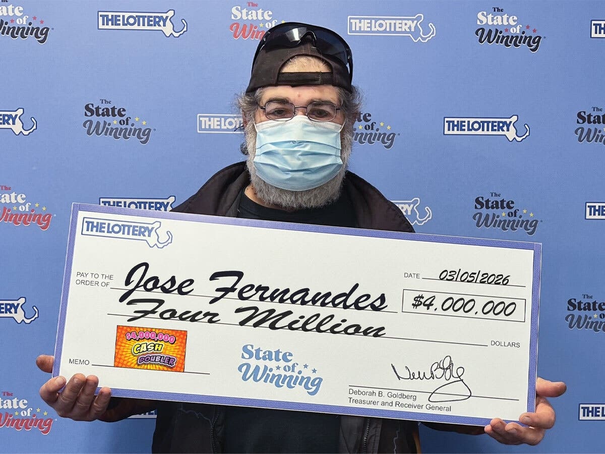 Woburn resident Jose Fernandes won $4 million in a new lottery game, and chose to receive cash totaling $2.6 million.